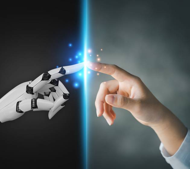 Robot and human hands pointing to each other, the idea of creati Robot and human hands pointing to each other, the idea of creating futuristic AI, intelligent systems to work instead of humans and do what humans can't. Creating innovative technology of the future.